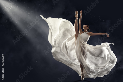 Billede på lærred Ballerina Jumping in White Silk Dress, Modern Ballet Dancer in Pointe Shoes, Flu