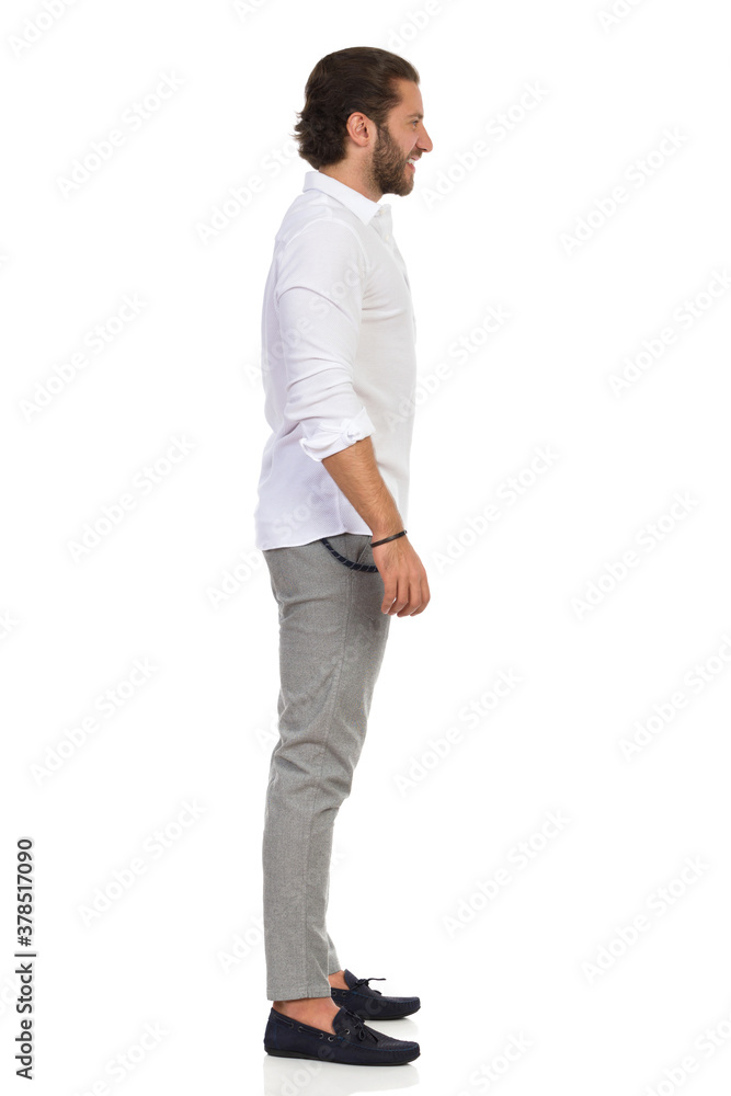 Fototapeta premium Side View Of Standing Elegant Man