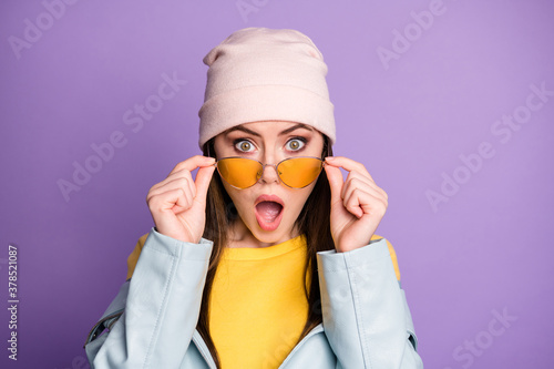 Close up photo of astonished girl see unbelievable novelty stare stupor impressed shout wow omg wear good look outfit isolated over purple color background