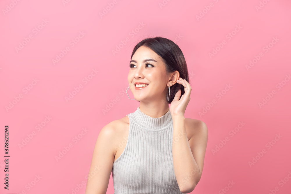 Beautiful portrait Asian woman in studio pink background. Beautiful portrait Asian woman in studio pink background.