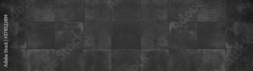 Seamless grunge dark black anthracite grey gray square mosaic concrete cement stone wall tiles pattern texture wide background banner panoramic panorama
