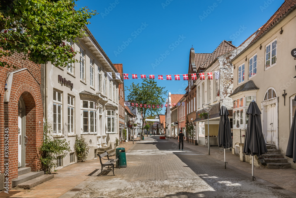 picturesque street with danish flags in Tonder, Denmark