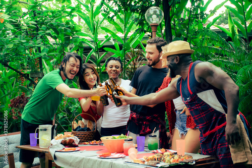 Group of friends enjoying party outdoors