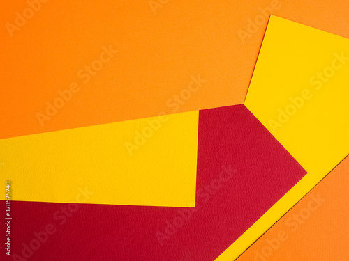 Multicolored paper background. yellow orange red abstract for summer background.
