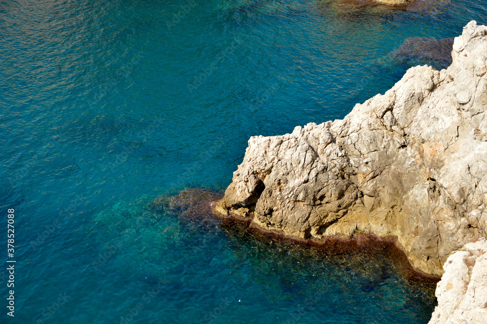 rocky cliff in the adriatic sea, Dubrovnik, Croatia