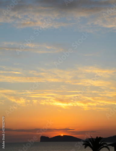 sunset over capo caccia, alghero, sardinia, italy