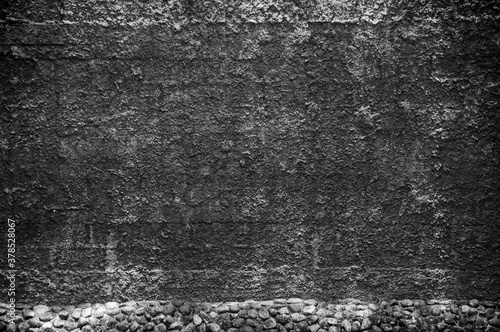 Abstract weathered rough gray cement or concrete texture background with vignette.