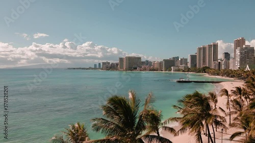 Wallpaper Mural Drone footage of Waikiki Bay. Waikīkī is a Honolulu neighborhood and the eponymous Waikīkī beach on its south shore, on the island of Oʻahu in the U.S. state of Hawaii.  Aerial photography Torontodigital.ca