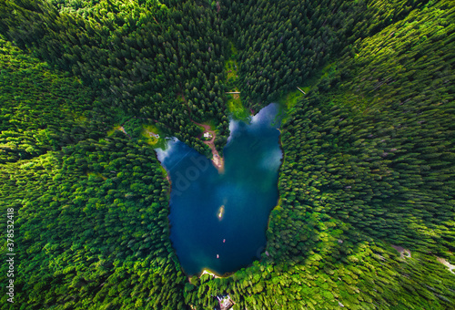 Aerial view of Lake Synevir in the Carpathian Mountains in Ukraine. Synevyr National Nature Park, Carpathians, Ukraine.  photo