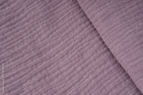 Cotton textile - close up of fabric texture. Cotton Fabric Texture. Top View of Cloth Textile Surface. Clothing Background. Text Space Abstract background and texture for designers.