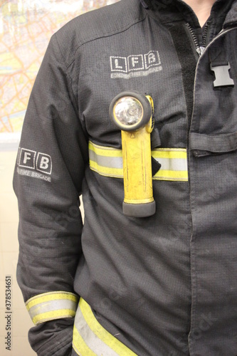 London fire brigade uniform firefighter - LFB, torch  photo