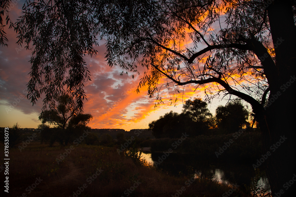 Incredibly beautiful sunset on the river. Reflection of orange-red clouds in the river. Play of colors. Untouched nature. Transparent living water.
Seversky Donets River in Ukraine Incredibly beautiful sunset on the river. Reflection of orange-red clouds in the river. Play of colors. Untouched nature. Transparent living water.
Seversky Donets River in Ukraine