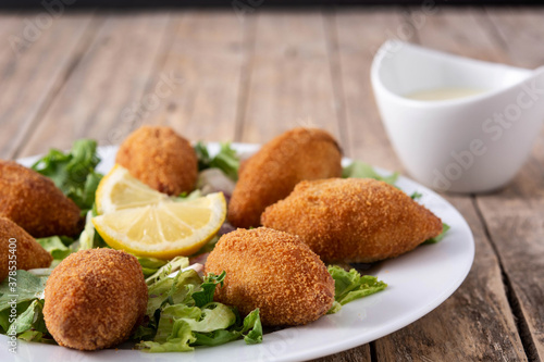 Traditional lebanese kibbeh on wooden table 