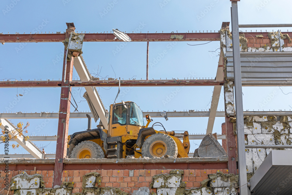 Fototapeta premium Excavator Demolition Building