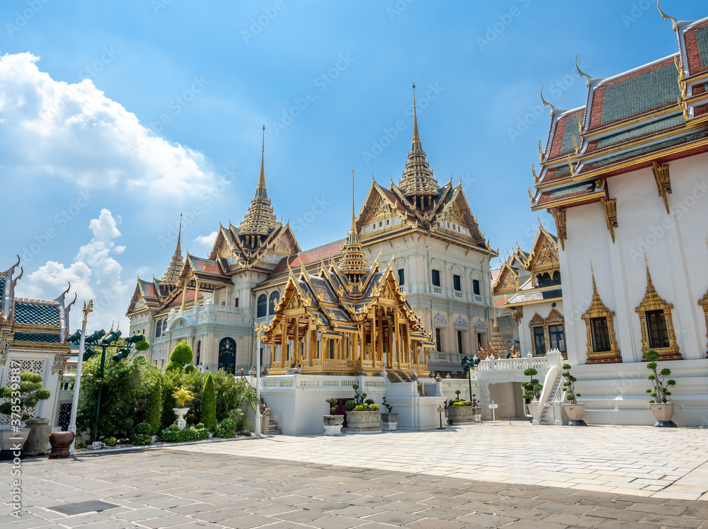 Fototapeta premium Chakri Maha Prasart Throne Hall, one of the most important and beautiful hall in The Grand Palace in Bangkok, Thailand, under summer blue sky