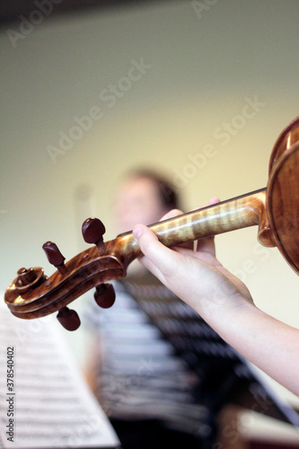 Violinist hand detail photo