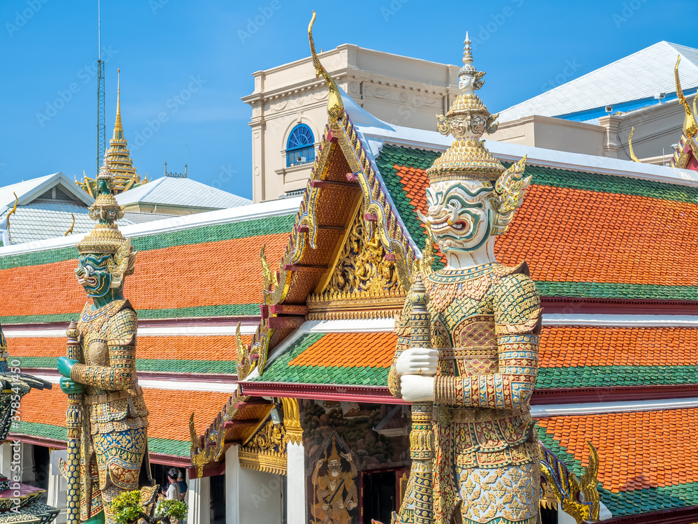 The great iconic giant, from Ramayana literature, act as guard protect entrance of The Temple of Emerald Buddha in Bangkok, Thailand