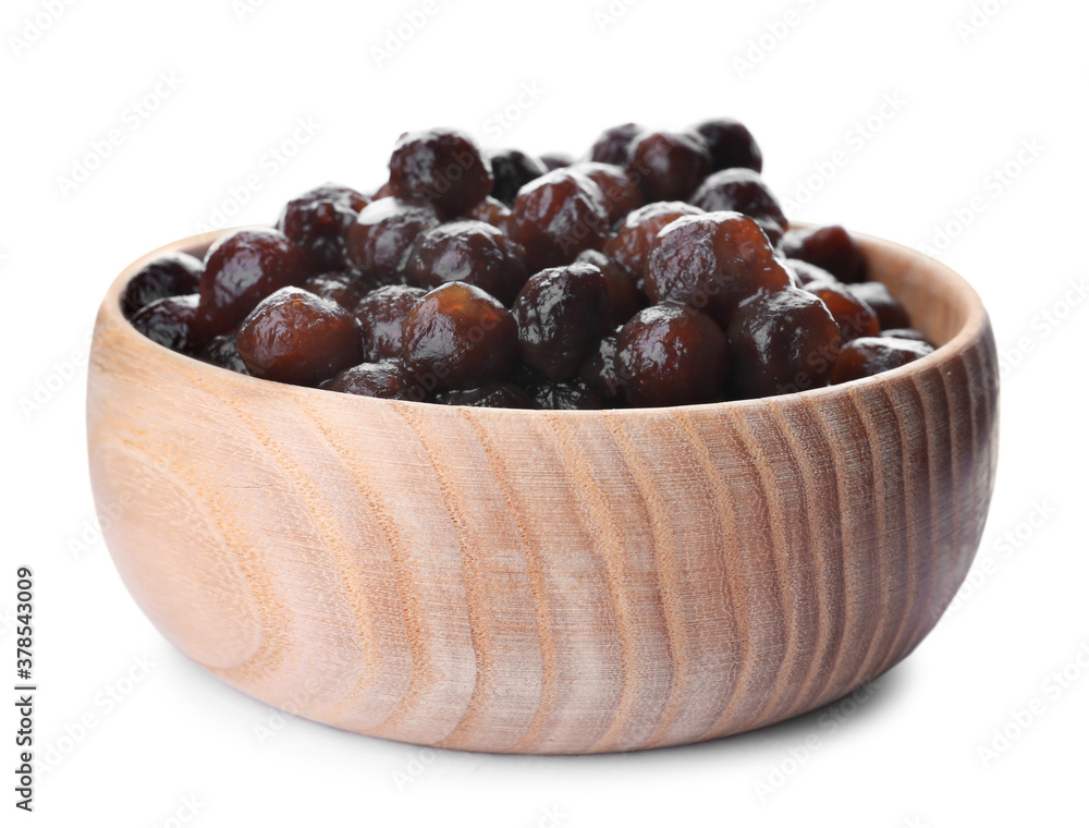 Tapioca balls for milk bubble tea in wooden bowl isolated on white Tapioca balls for milk bubble tea in wooden bowl isolated on white