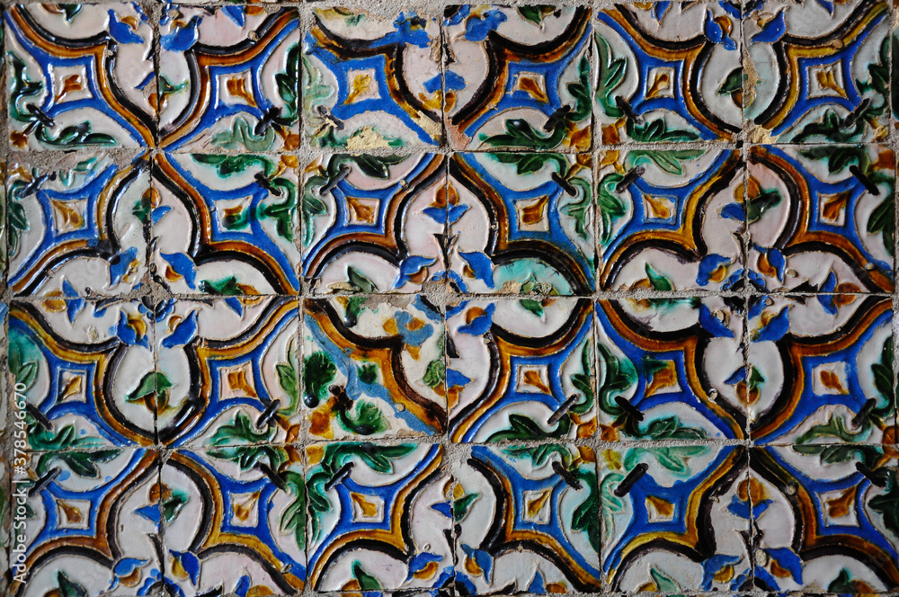 Ceramic tiles of the Royal Alcazars of Seville. Pattern decoration with floral motifs