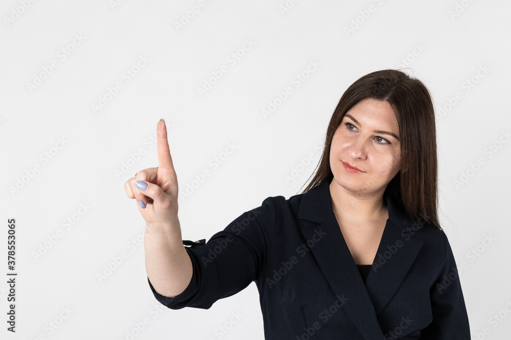 Young woman in blue is pushing the virtual button. Young woman in blue is pushing the virtual button.