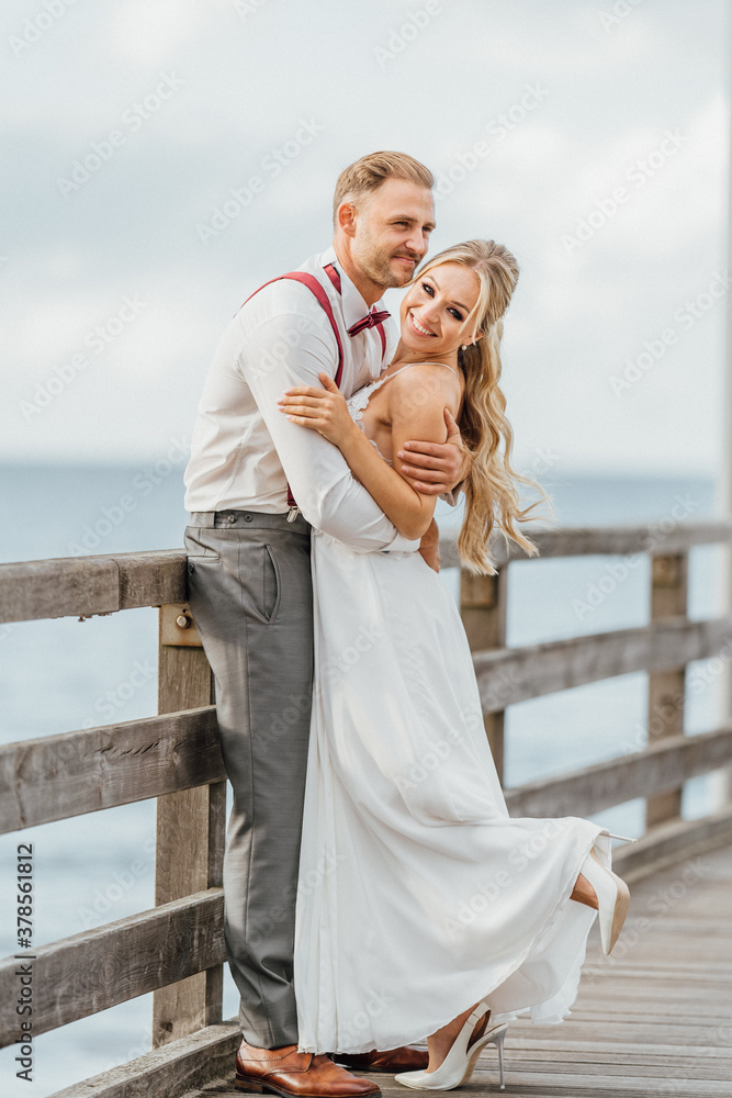 couple on vacation on the beach. just married