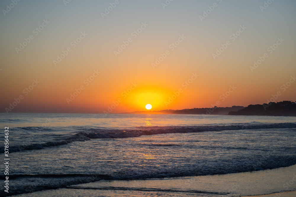 Falesia beach on the seashore at sunset. Olhos de Agua, Algarve, Portugal