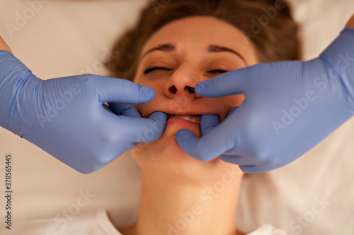 Manual sculpting  facial buccal massage photo