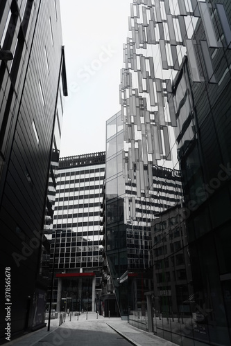 Modern buildings looming black and white