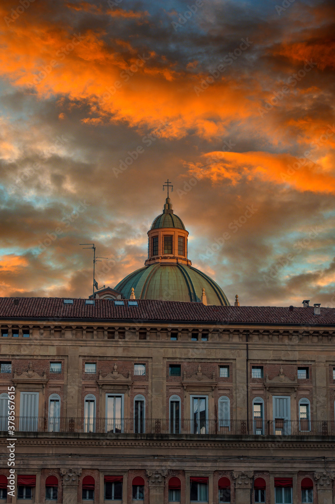 Bologna square with dramatic sunset
