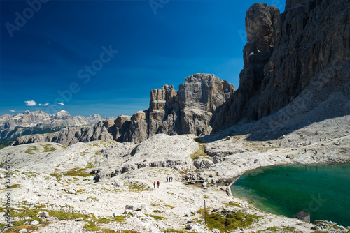 Lake in the Dolomites called Cascate Pisciadu beyond Gardena Pass in Italy nice weather photo