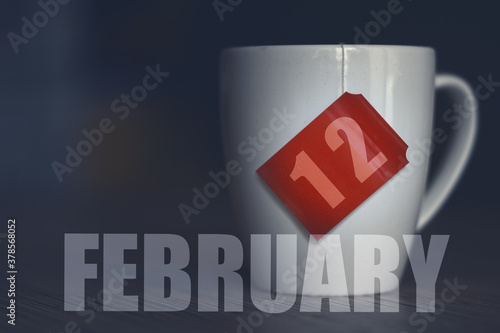 february 12th. Day 12 of month,Tea Cup with date on label from tea bag. winter month, day of the year concept