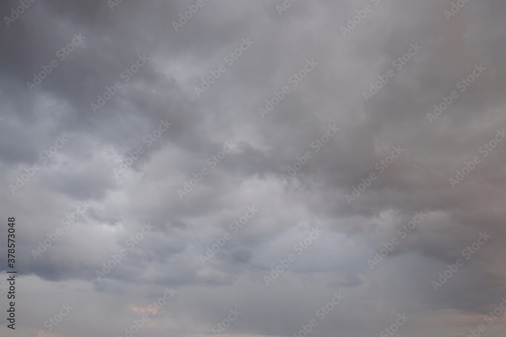 Gray cloudy sky as background. Dramatic sky. Gray cloudy sky as background. Dramatic sky.