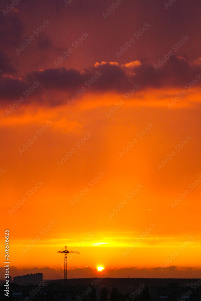 Obraz premium red and orange sun set on the open sky