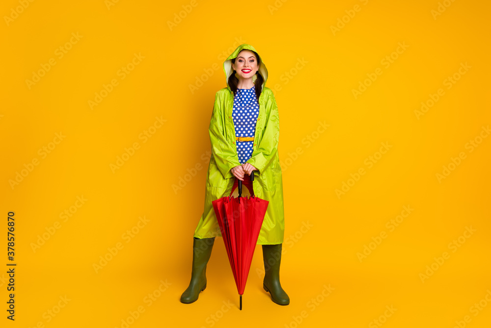 Full length body size view of her she nice attractive pretty cheerful cheery funky girl wearing hood cape good mood weather change isolated bright vivid shine vibrant yellow color background