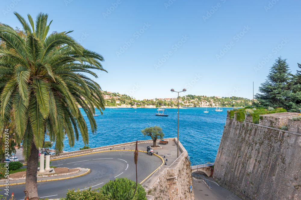 The scenic automobile road at the coastline of Mediterranean sea in Villefranche, France.