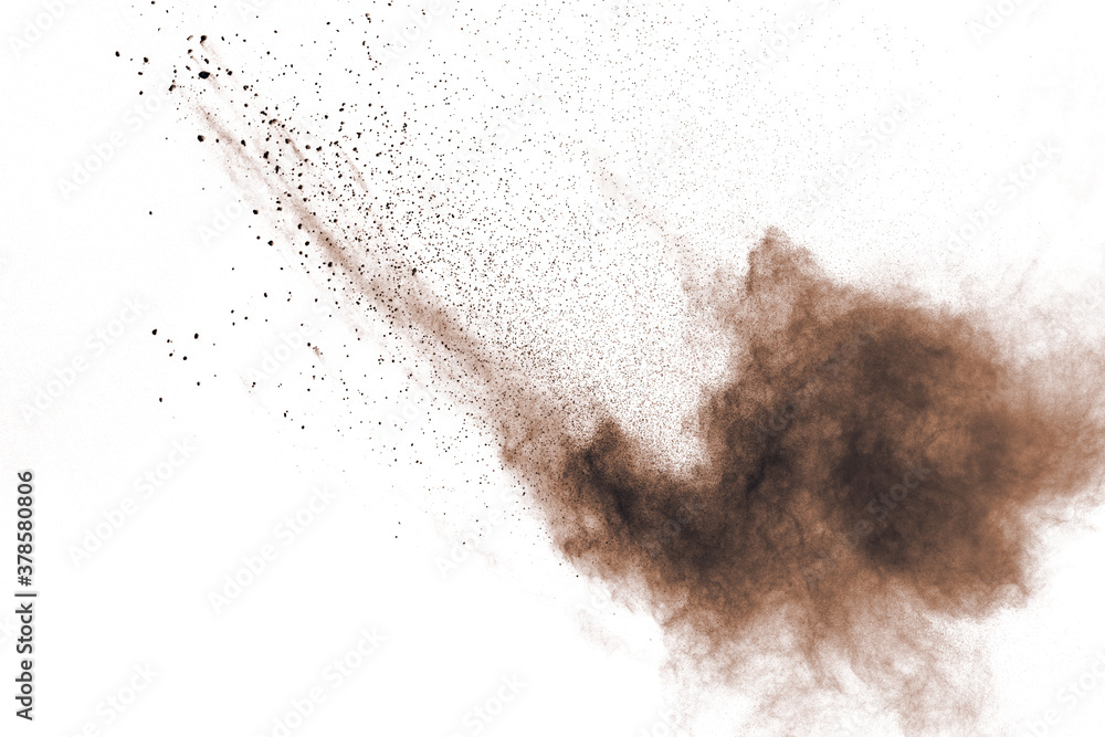 Brown powder explosion isolated on white background. Brown powder explosion isolated on white background.