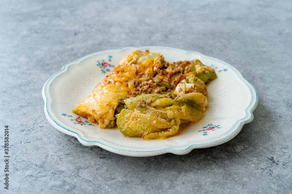 Naklejka premium Healthy Zucchini Lasagna Bolognese Cooked with Courgette in Plate Portion.