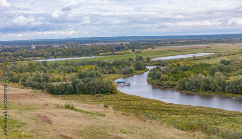 View  in early autumn from the high Bank at the confluence of the Toima river and Kama river . Russia, Tatarstan, Yelabuga. © Oleg
