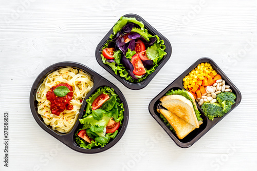 Healthy food in restaurant dish delivery. Top view, copy space
