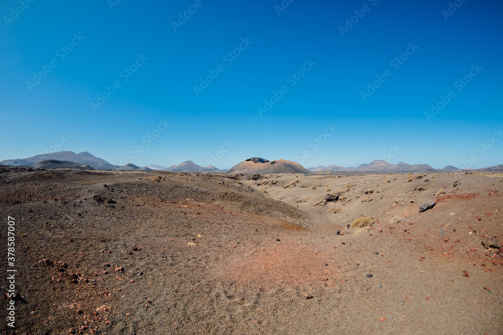 Volcanic landscape with lava, stones and rocks in Lanzarote