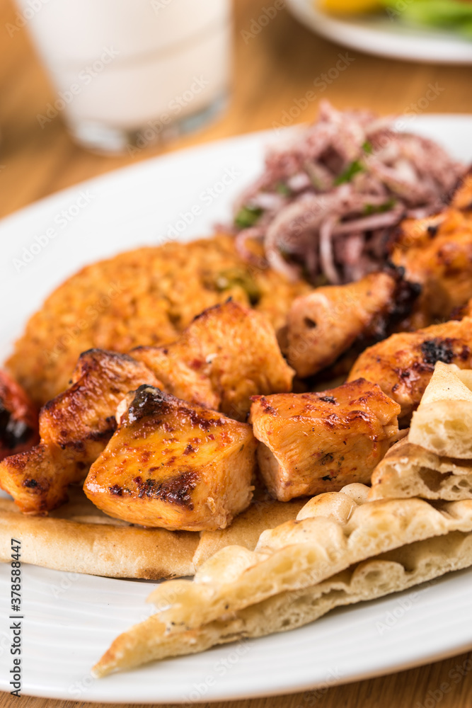 Traditional Turkish grilled Chicken shish kebab with vegetables grilled on skewers