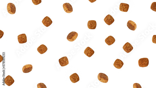 Obraz na plátně Dog food flying around poured in different directions on a white background