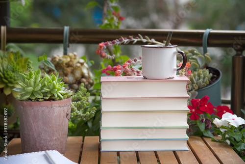 City balcony with vintage accessories beautiful succulents. Morning coffee on the terrace, home office.