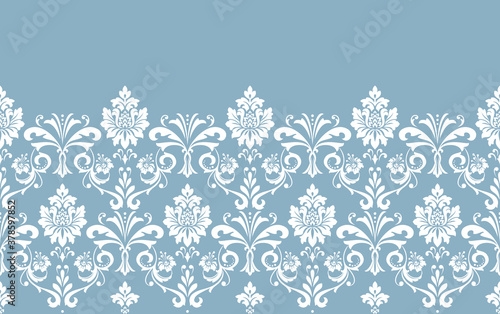 Wallpaper in the style of Baroque. Modern vector background. White and blue floral ornament. Graphic pattern for fabric, wallpaper, packaging. Ornate Damask flower ornament