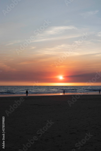 Sunset in a beach © Miguel
