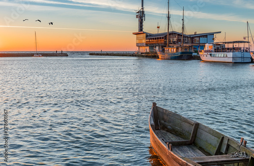 Fishing boats and pleasure motorboats docked at marina on Curonian spit, Lith...