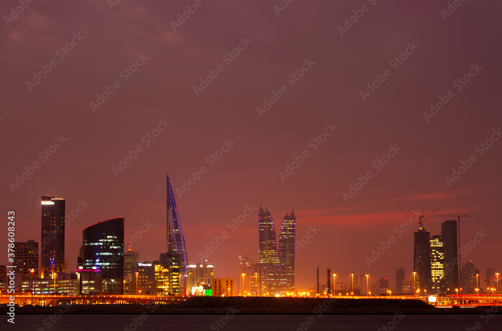MANAMA , BAHRAIN - DECEMBER 08: Bahrain skyline with iconic towers during dusk on December 08, 2019, Bahrain