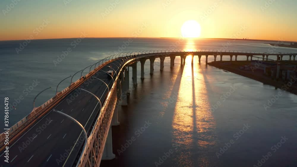 High-speed toll road, highway bypassing the city center St. Petersburg, the central section of the western high-speed section. A beautiful view of the sunset over the Gulf of Finland. High-speed toll road, highway bypassing the city center St. Petersburg, the central section of the western high-speed section. A beautiful view of the sunset over the Gulf of Finland.