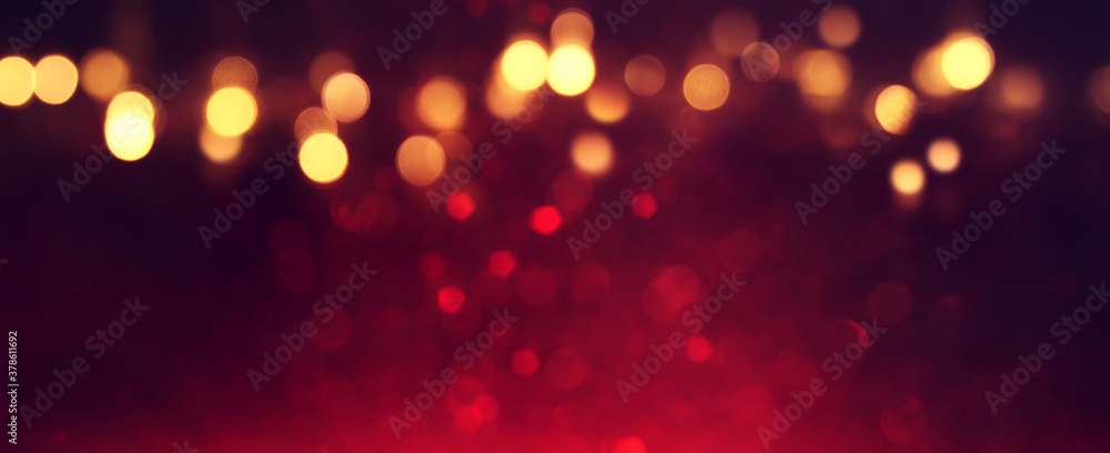 background of abstract red, gold and black glitter lights. defocused background of abstract red, gold and black glitter lights. defocused