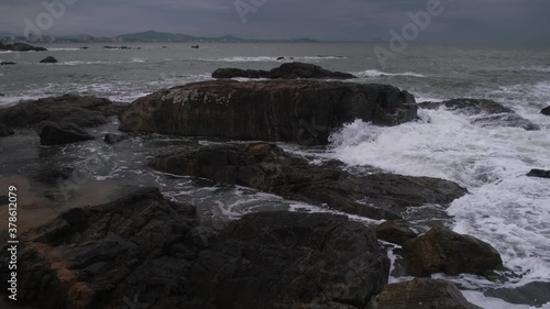 storm over the sea waves and rocks 